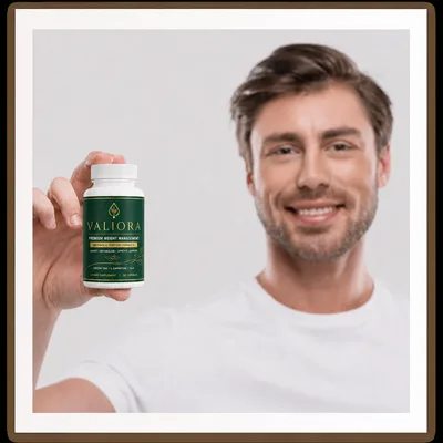 Valiora customer holding the metabolic support bottle